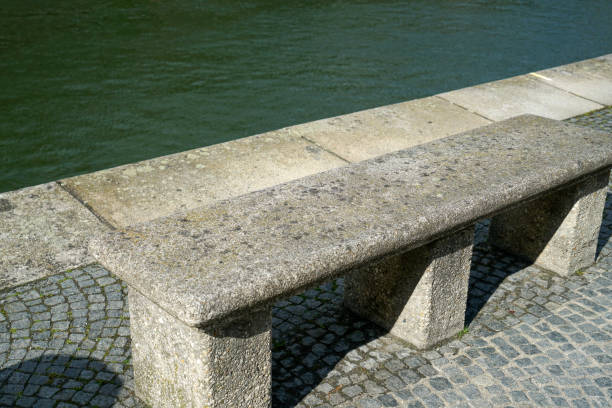 istock Benches and chairs at tables invite you to relax 1854675740