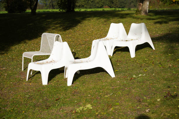 istock Benches and chairs at tables invite you to relax 1854678044