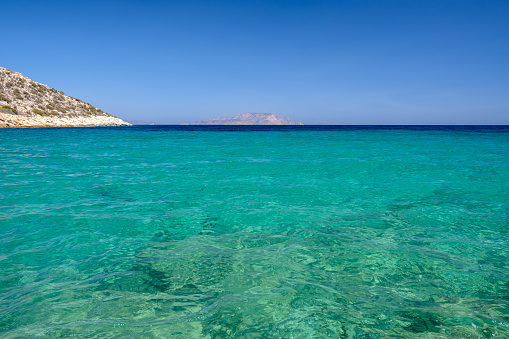 Panoramic view of the amazing sandy and turquoise beach of Agia Theodoti in Ios Cyclades Greece