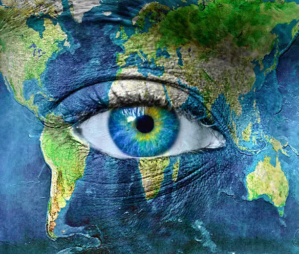 Photo of Planet earth and blue human eye