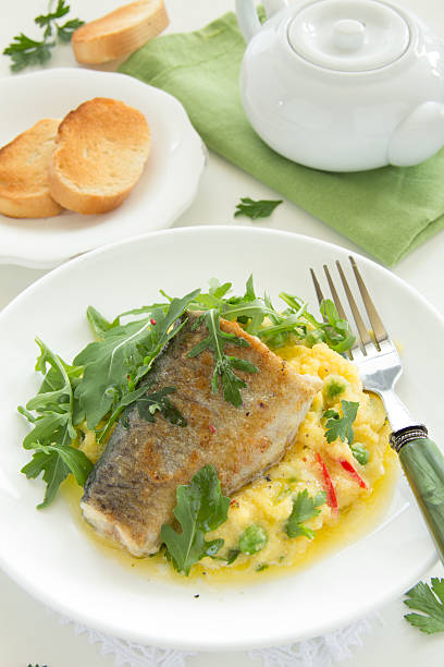 istock Grilled trout with couscous and vegetables. 185477074