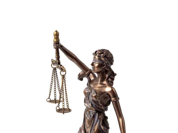 istock Bronze statue of Lady Justice on a white background. 1854784880