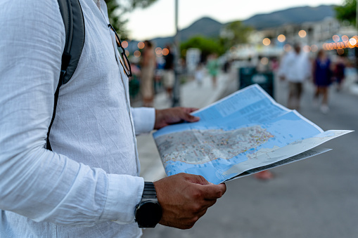 As the city moves to its own beat, the young man finds his tune. With a map as his score and a backpack filled with notes, he creates his urban symphony