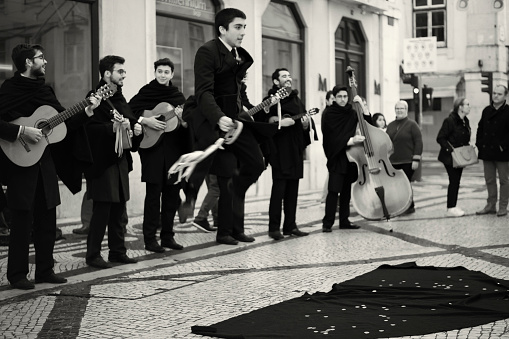 Lisbon, Portugal - January 15, 2023: College students perform at the Rua August street in Libon downtown.