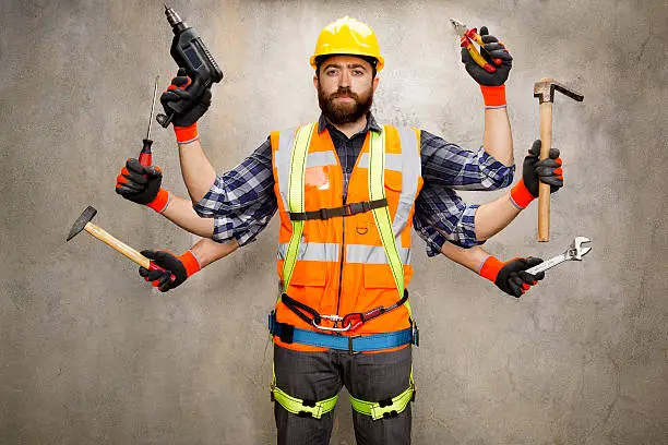 Construction worker with 6 arms holding tools.