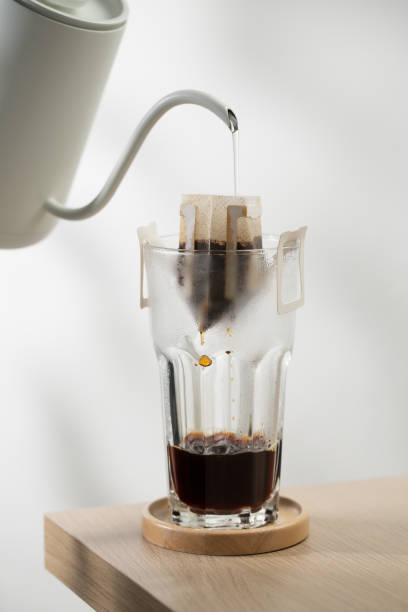 istock Brewing coffee through pre-made paper filters. 1854798187