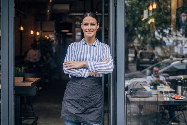 istock Portrait of Smiling cafeteria owner 1854807191