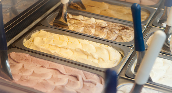 Display case of various flavors of frozen gelato