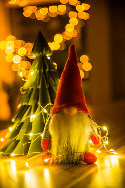 istock Christmas elf with Christmas lights 1854846614