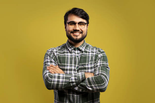 istock man with glasses with arms crossed 1854852035
