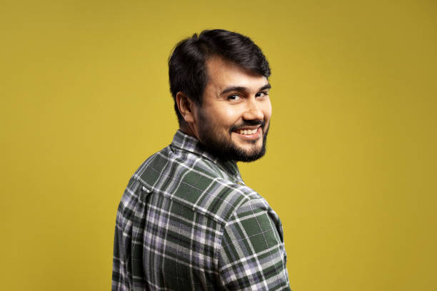 istock man with his back turned to look at the camera 1854854269