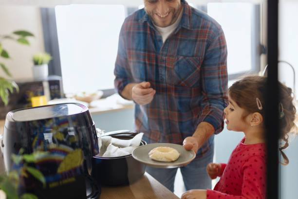 istock People using Air Fryer in the kitchen 1854855358