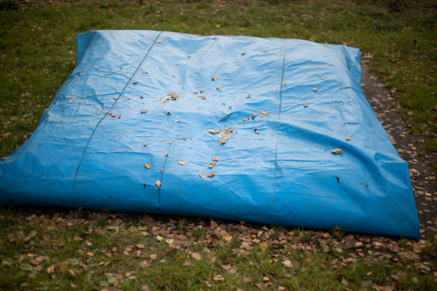 istock Blue awning. Rolled up awning in nature. Rain protection. 1854858042