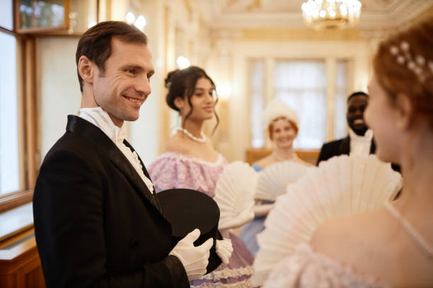 istock Gentleman talking to young lady 1854861788