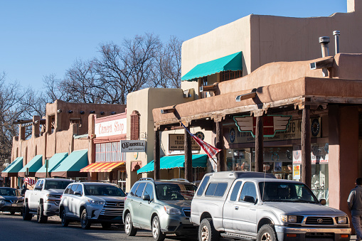 Frontage, USA - June 17, 2019: City near Santa Fe with gas station prices and Nambe Falls Casino gambling building by highway road 285 traffic and signs