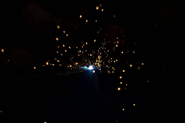 istock Metal welding. Steel welding. Work in workshop. Sparks from heating. 1854865596
