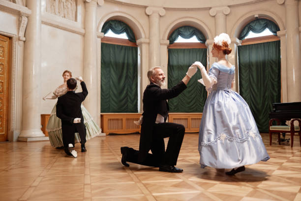 istock Ladies Dancing Around Gentlemen Partners 1854867232