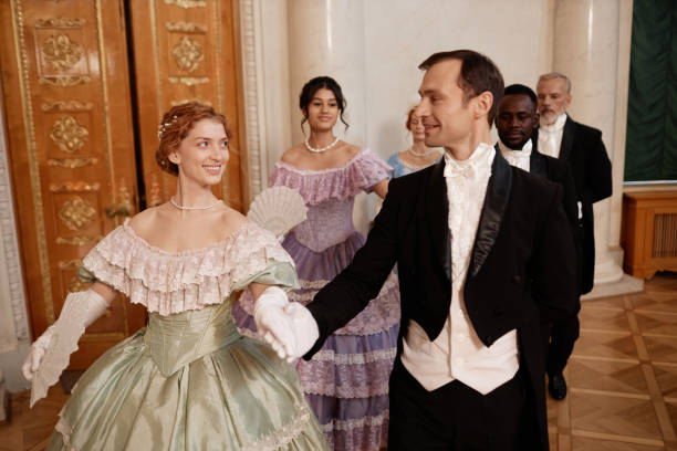 istock Couples in Line Enjoying Dance Ball in Palace 1854867753