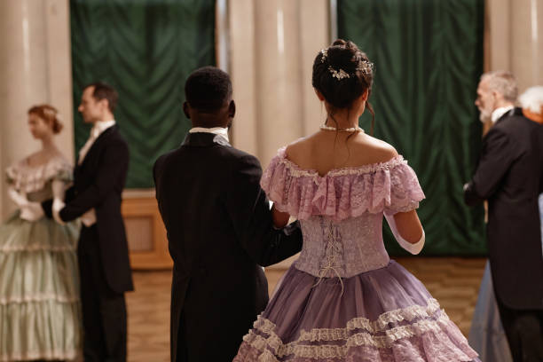 istock Back View Lady and Gentleman Entering Ballroom 1854868832