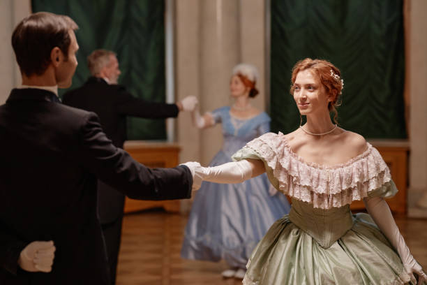 istock Lady Dancing with Gentleman in Palace Ballroom 1854870972