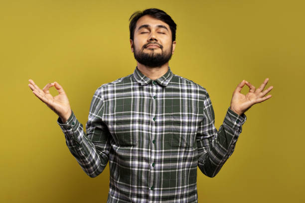 istock man making OK sign with both hands, eyes closed 1854873073