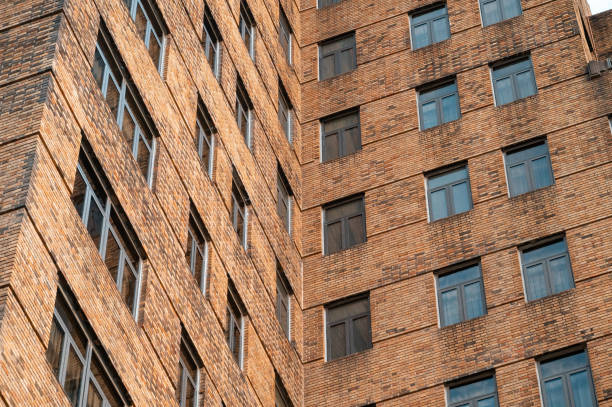 istock The exterior facade and windows of brick walls in old-fashioned buildings 1854915744