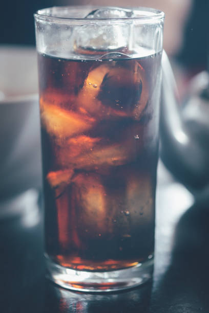 istock Glass of cold cola soft drink with ice 1854940069