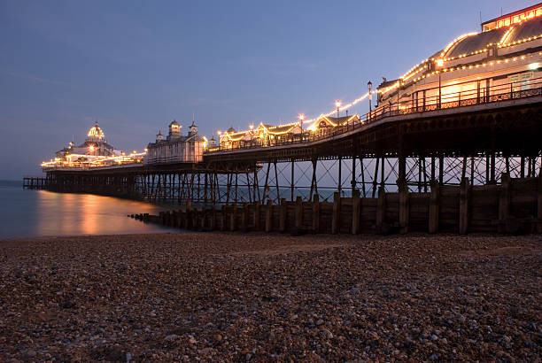 Eastbourne pier Eastbourne pier at dusk, United Kingdom eastbourne pier photos stock pictures, royalty-free photos & images