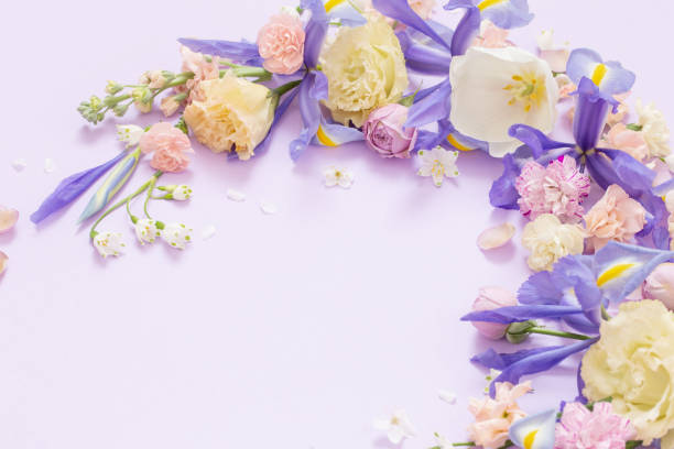 istock beautiful spring flowers on paper background 1854978707