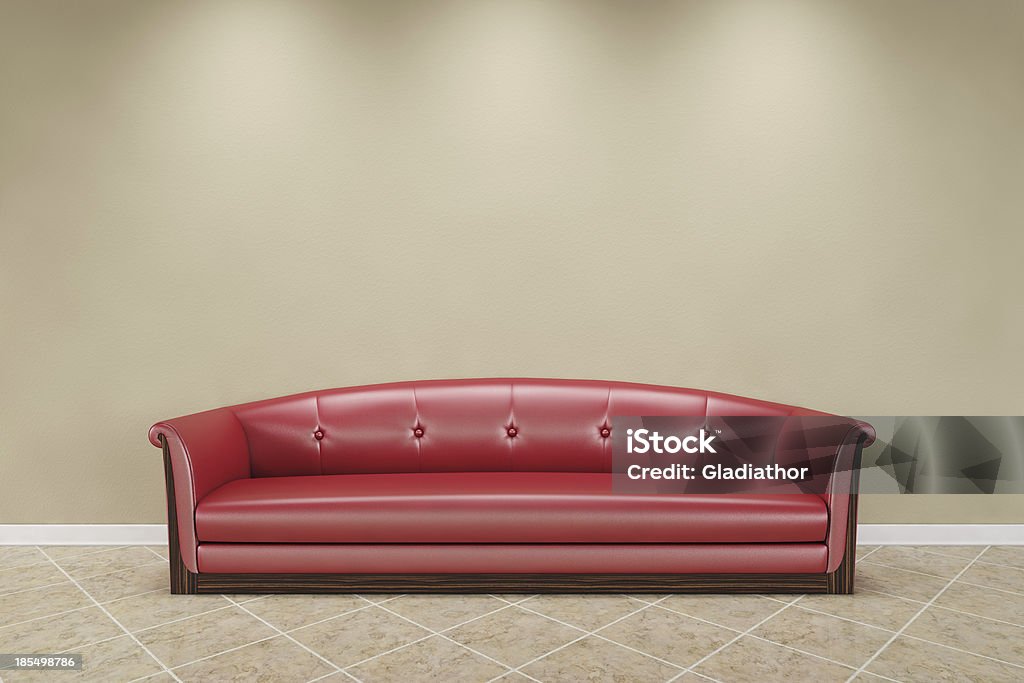 Sofá vermelho na frente da parede de bege - Foto de stock de Artigo de decoração royalty-free