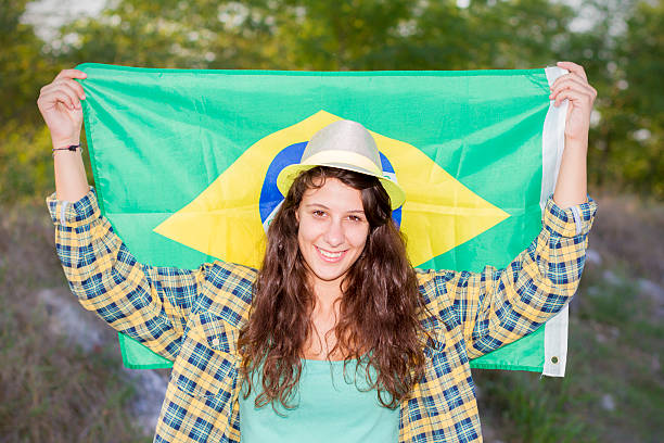 istock Brazilian supporter with flag 185501309