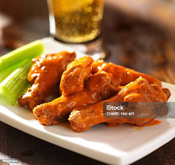 Buffalo Chicken Wings With Celery Stock Photo - Download Image Now - Buffalo Chicken Wings, Chicken Wing, Dipping Sauce