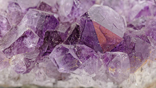 istock crystal macro photo in purple color 185501595