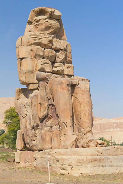istock Right statue of the two Memnon colossi (Luxor, Egypt ) 185501986