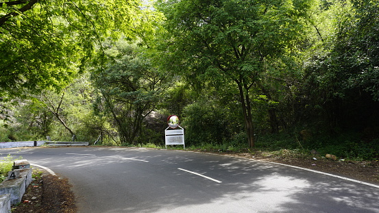 Outdoor traffic convex mirror in the hairpin bends and uphill road enroute to kodaikanal hilltop. Installed for improving safety.