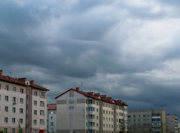istock Gloomy skies and thunderclouds hung over the multi-storey buildings 1855045265