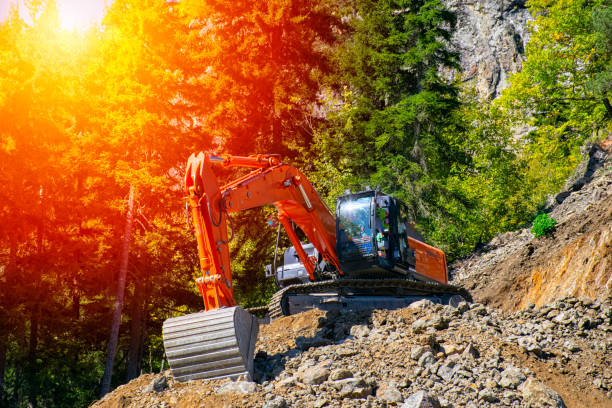 istock Excavator at the construction site on the slope 1855053836