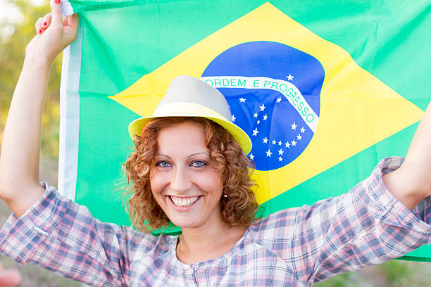 istock Brazilian supporter with flag 185505465