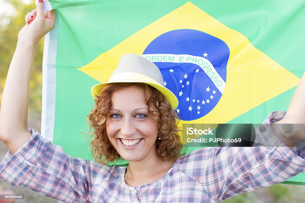 Brazilian supporter with flag 20-29 Years Stock Photo