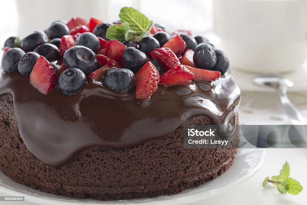 Chocolate cake with summer berries. Baked Stock Photo