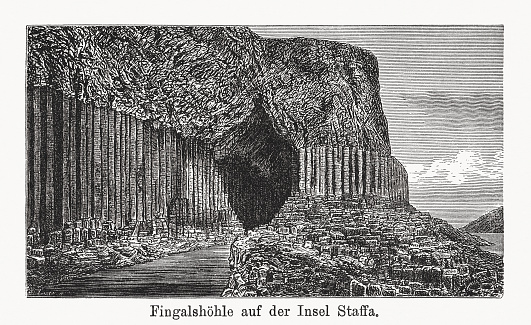 Historical view of the basalt columns of the Fingal's Cave on the Scottish island Staffa. Wood engraving, published in 1894.