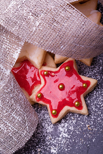 istock star cookies with red jelly and powder sugar 185507178