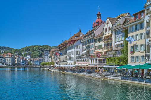 Lucerne, Switzerland - July 13, 2022:  View of the houses of the old town on the Reuss River Banks