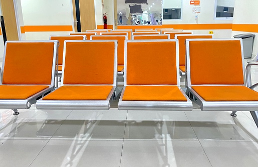 Orange Chairs lined up in the waiting room