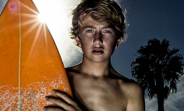 Teen Surfer stock photo