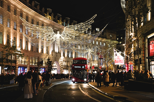Regent Street, Central London, England, UK – November 22nd 2023: the best of modern British design with London Regent Street’s Christmas lights and street decorations in 2023. Regent Street Christmas Lights are seen in the photo, the largest holiday lights display in the UK, light up the skies of Regent Street and St James’s streets. 