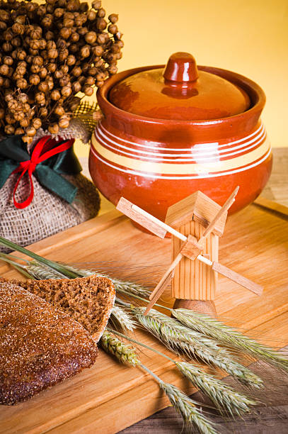 istock sliced bread and wheat on the wooden table 185511144