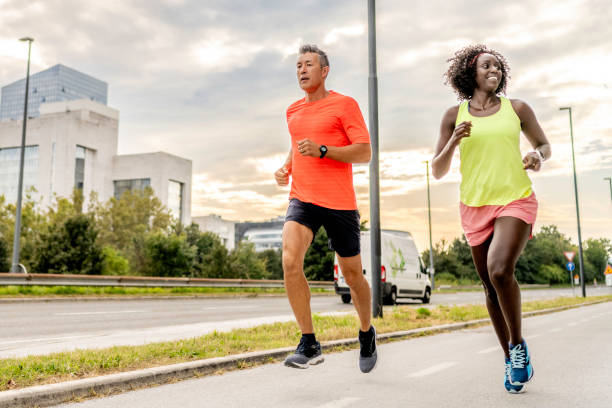 istock Multiracial couple running outdoors 1855118659
