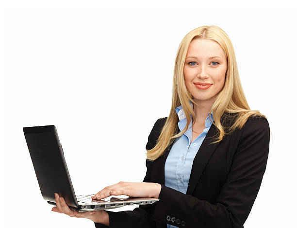 istock smiling woman with laptop computer 185513746