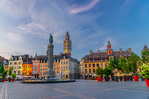 La Grand Place square in Lille city center, historical monument Flemish mannerist style buildings, Column of Goddess, Vieille Bourse in the evening, French Flanders, Nord department, Northern France